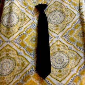 Young men’s/boys black satin clip on tie. Brand new never worn.